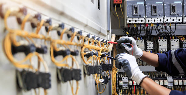 Professional Generator Installation technician working in Sand Lake, MI